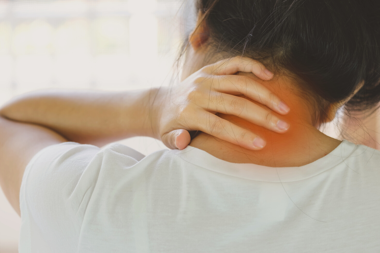 Closeup of Young Woman Suffering from Pain in Neck While Sitting on Bed at Home, People with Body-Muscles Problem, Healthcare and Medicine Concept